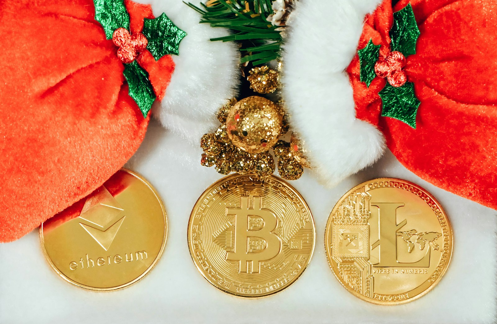 a bunch of gold coins sitting on top of a white table